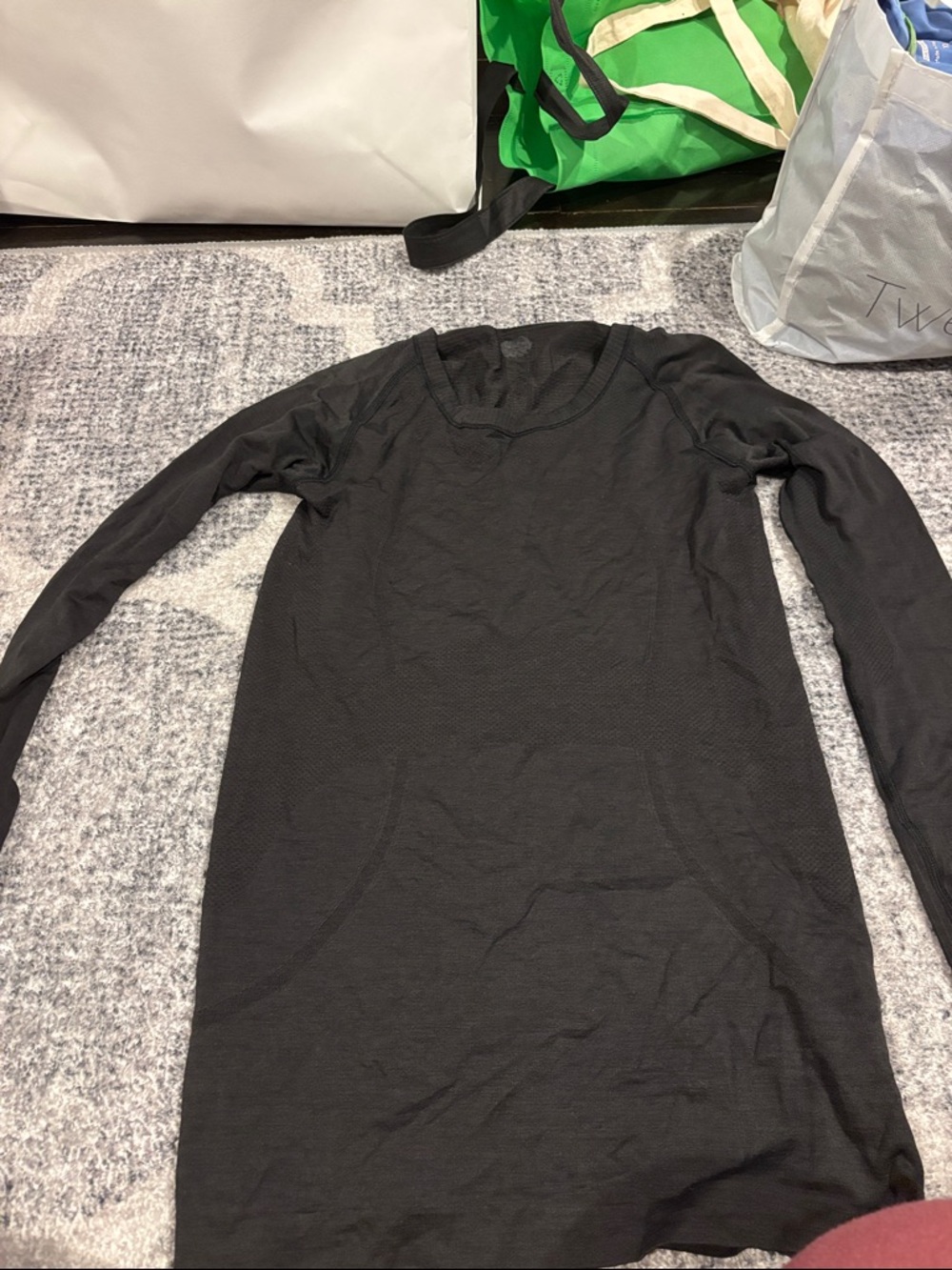 Black Lulu lemon size 6 tight workout shirt. Tags taken out